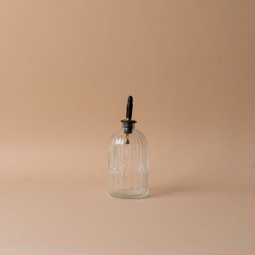 Fluted Bottle with Spout glass bottle Luxe B Co (Faire)