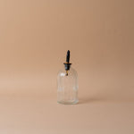 Fluted Bottle with Spout glass bottle Luxe B Co (Faire)