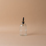 Fluted Bottle with Spout glass bottle Luxe B Co (Faire)