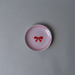 Holiday Bow Porcelain Dish Set CHRISTMAS 2025 DANICA (Faire) Light Pink Plate