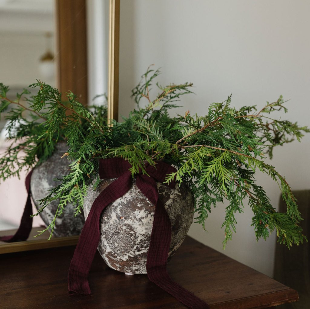 holiday collection vintage vase with greenery